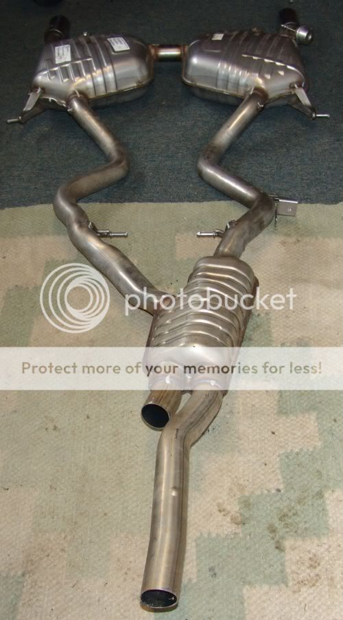 what is the difference between "suitcase" mufflers and traditional